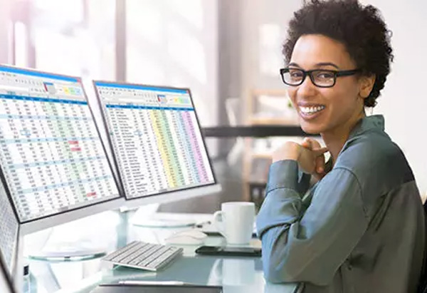 HR administrator reviewing payroll and benefits records