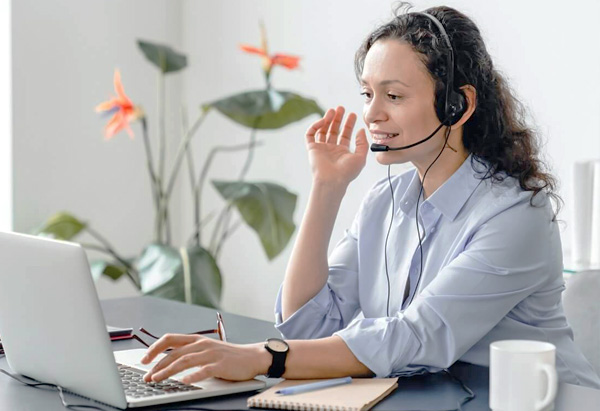 HR professionals reviewing an employee handbook